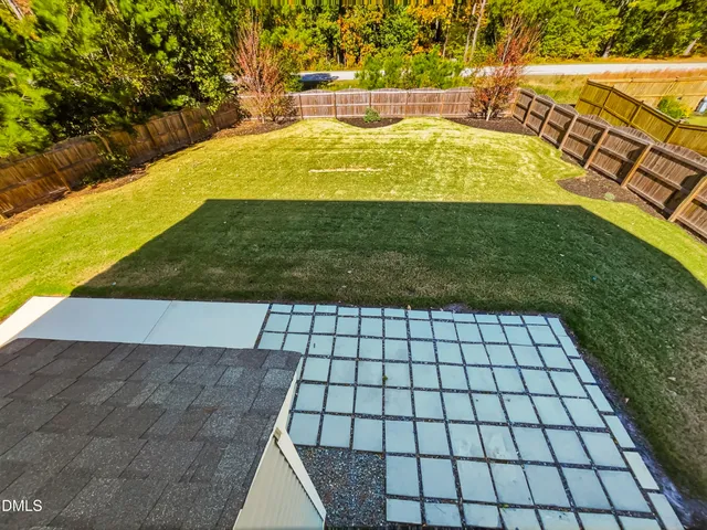 a view of a swimming pool and an outdoor space