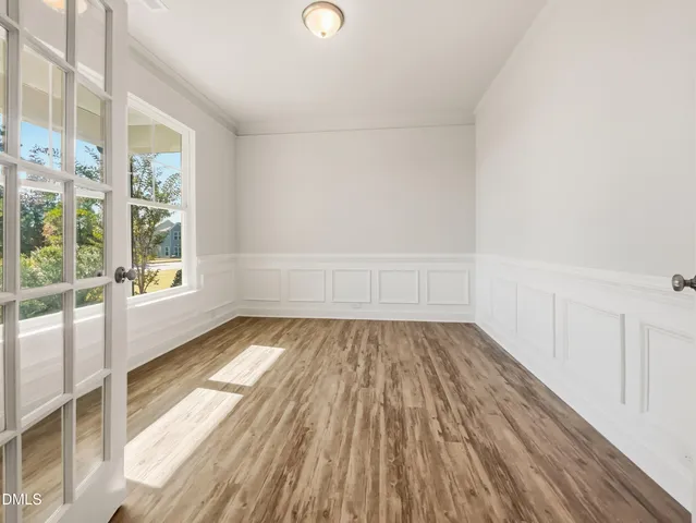 a view of an empty room and window