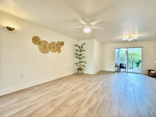a view of a livingroom with wooden floor