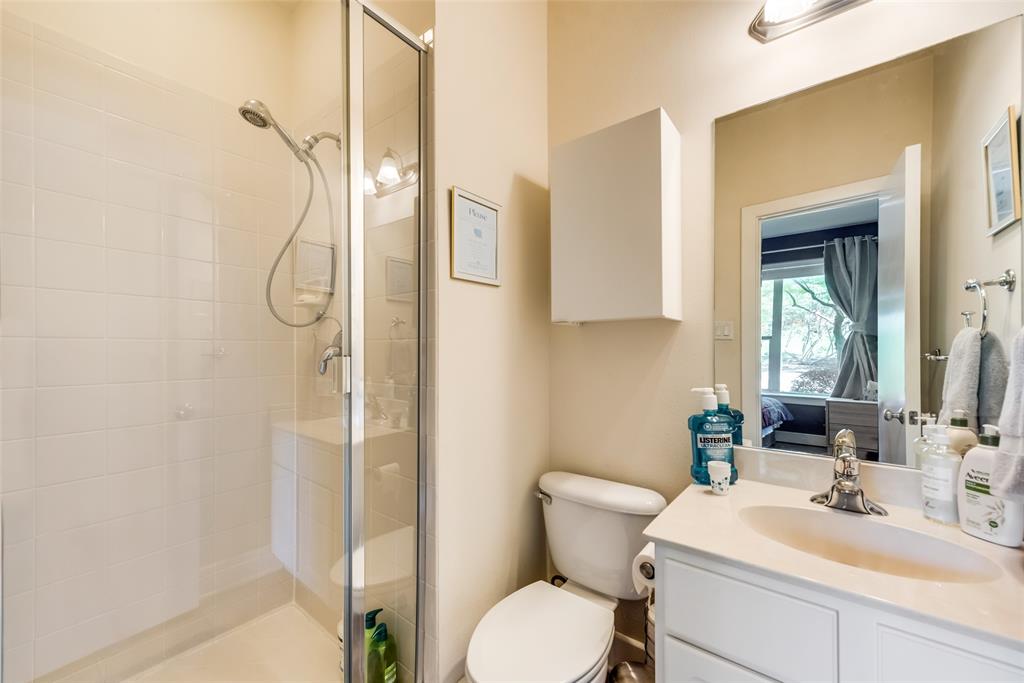 2718 Floyd Street Dallas, TX 75204 - Photo 13 of 25 a bathroom with a sink toilet and shower