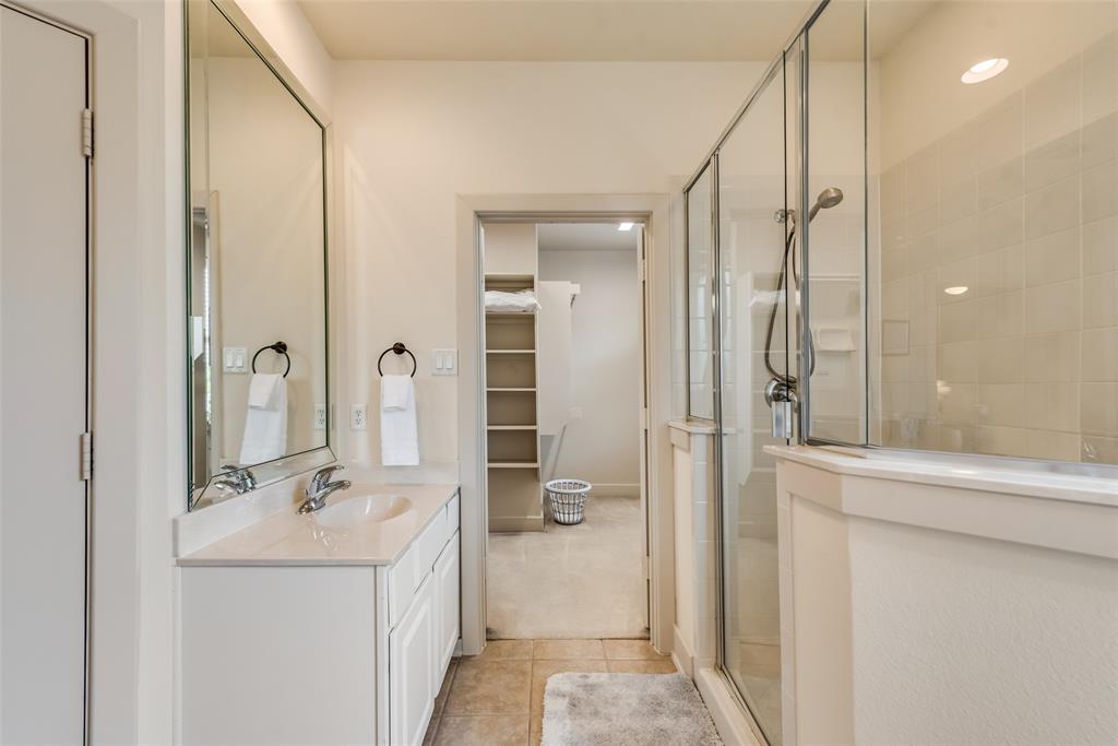 2718 Floyd Street Dallas, TX 75204 - Photo 10 of 25 a bathroom with a sink a toilet and shower