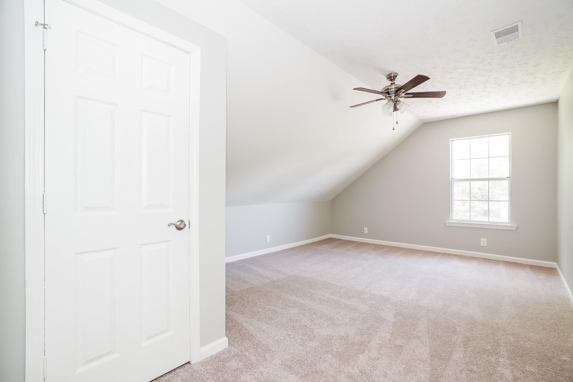 207 Independence Street Springfield, TN 37172 - Photo 18 of 25 a view of an empty room with a window