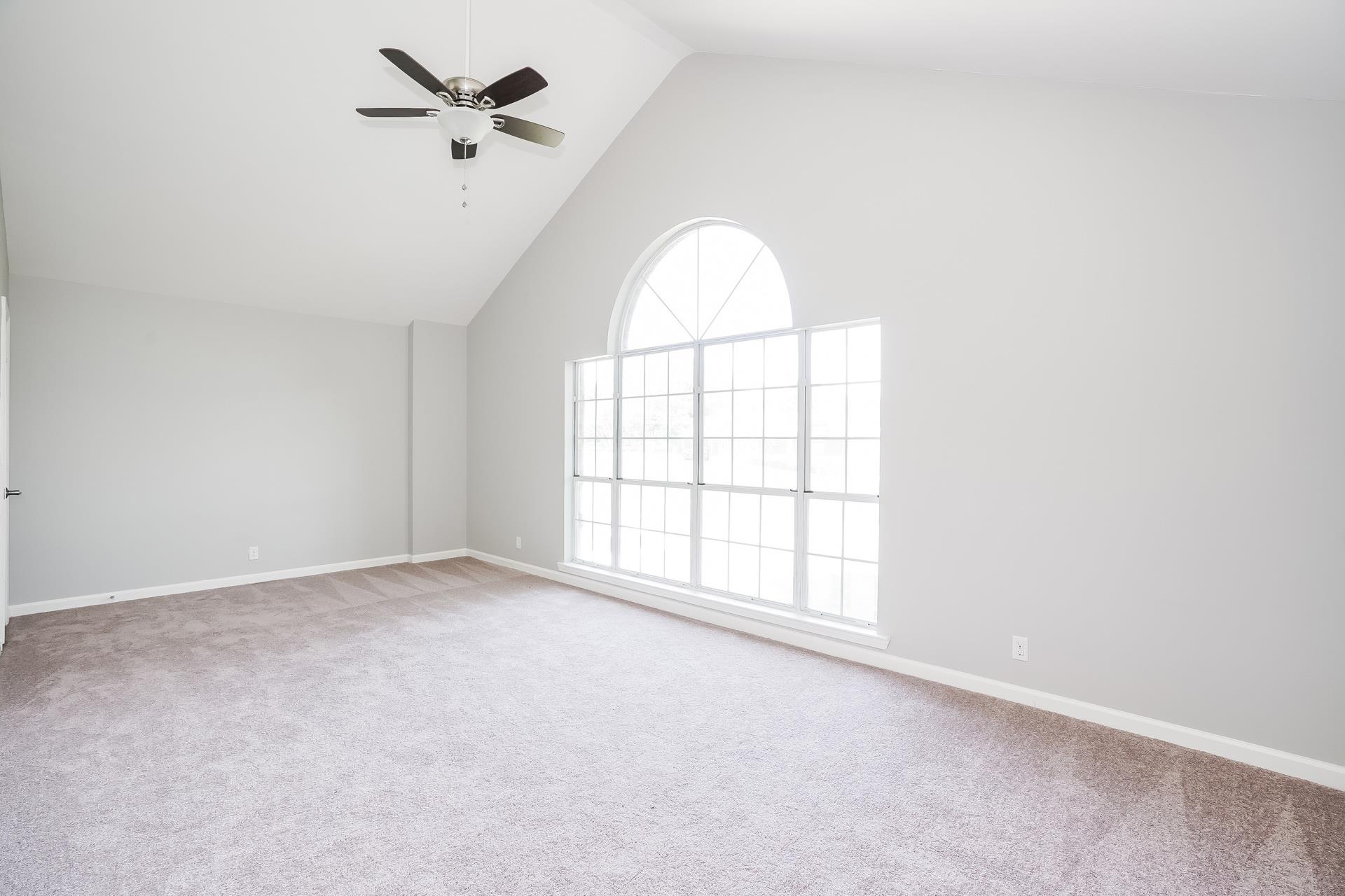 207 Independence Street Springfield, TN 37172 - Photo 20 of 25 an empty room with windows and fan
