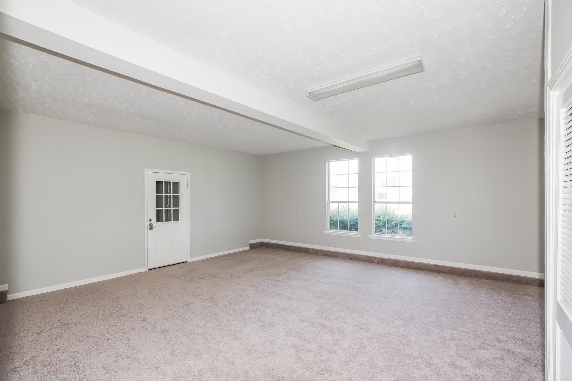207 Independence Street Springfield, TN 37172 - Photo 21 of 25 an empty room with windows