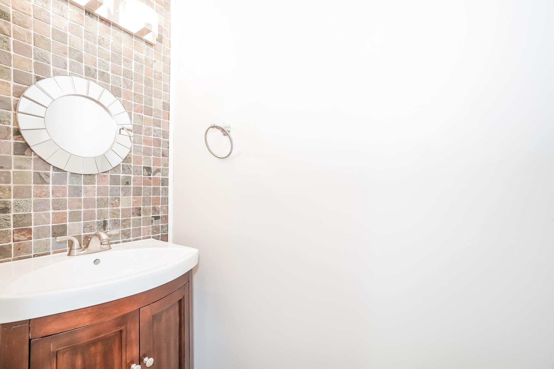 207 Independence Street Springfield, TN 37172 - Photo 22 of 25 a bathroom with a sink and a mirror