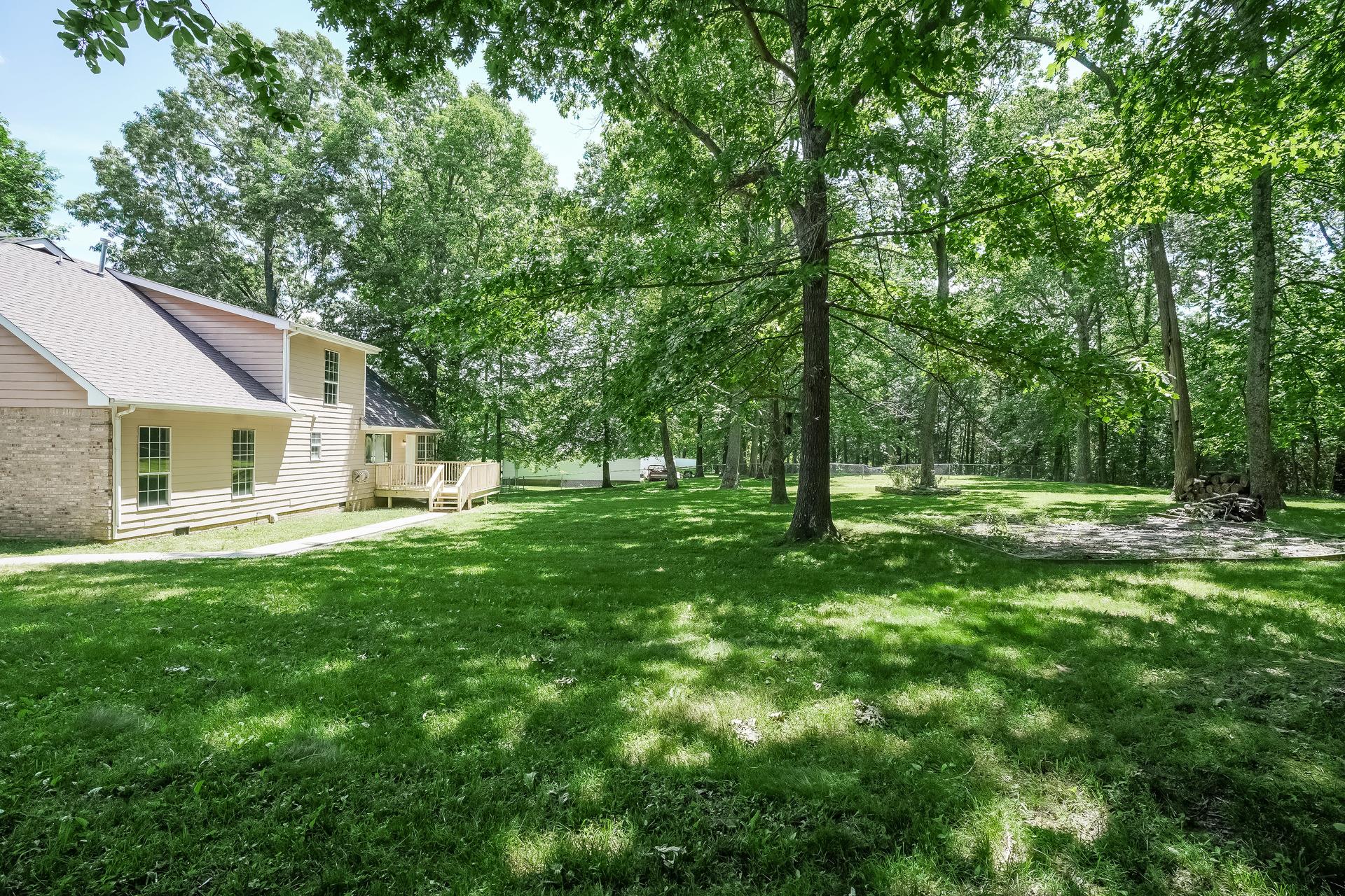 207 Independence Street Springfield, TN 37172 - Photo 23 of 25 a backyard of a house with lots of green space