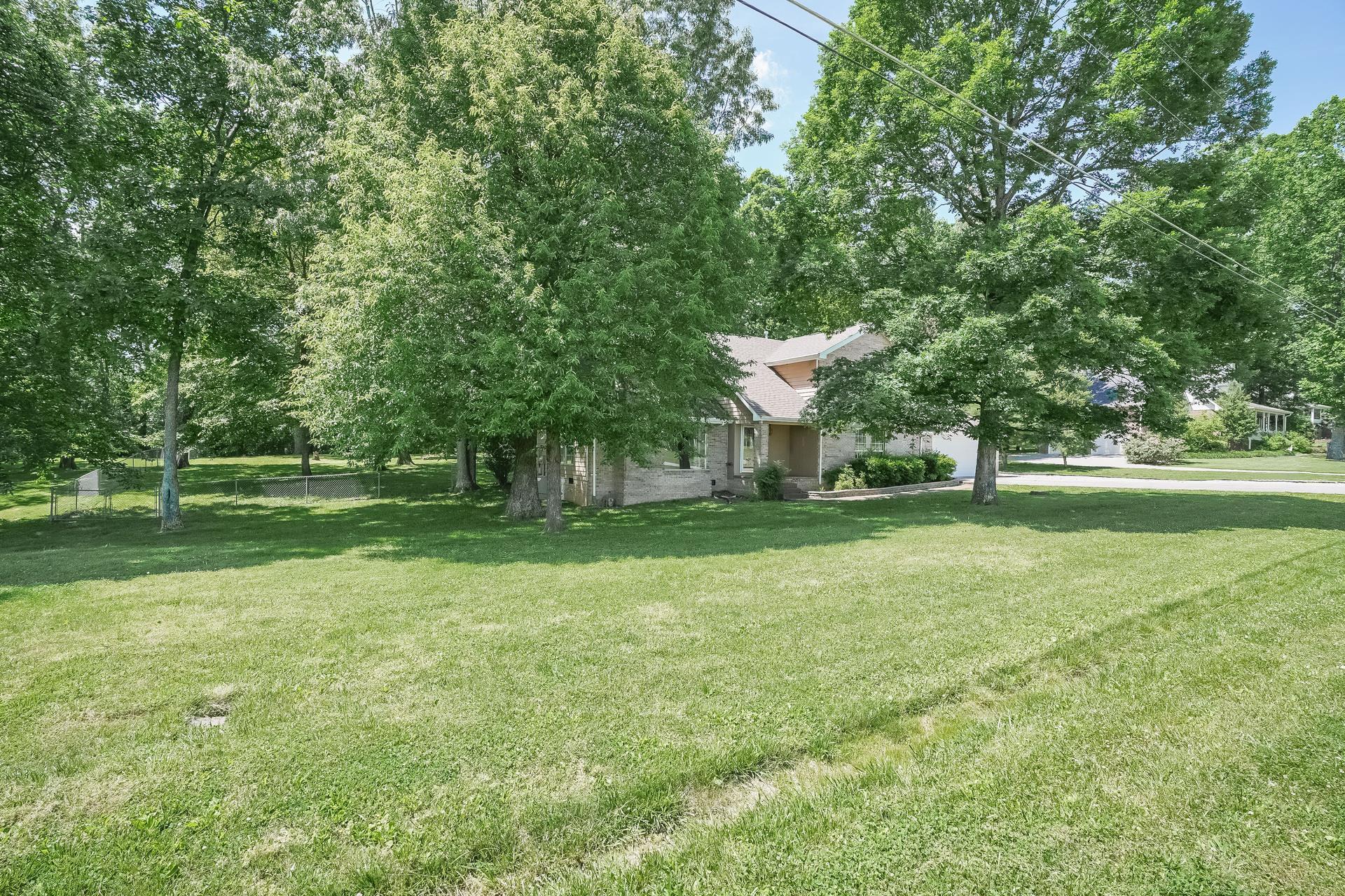 207 Independence Street Springfield, TN 37172 - Photo 24 of 25 a view of a park with large trees