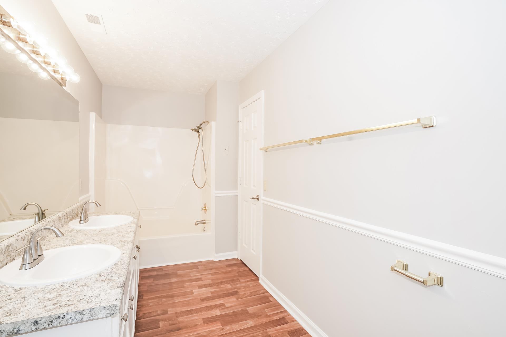 207 Independence Street Springfield, TN 37172 - Photo 4 of 25 a bathroom with a sink and a mirror