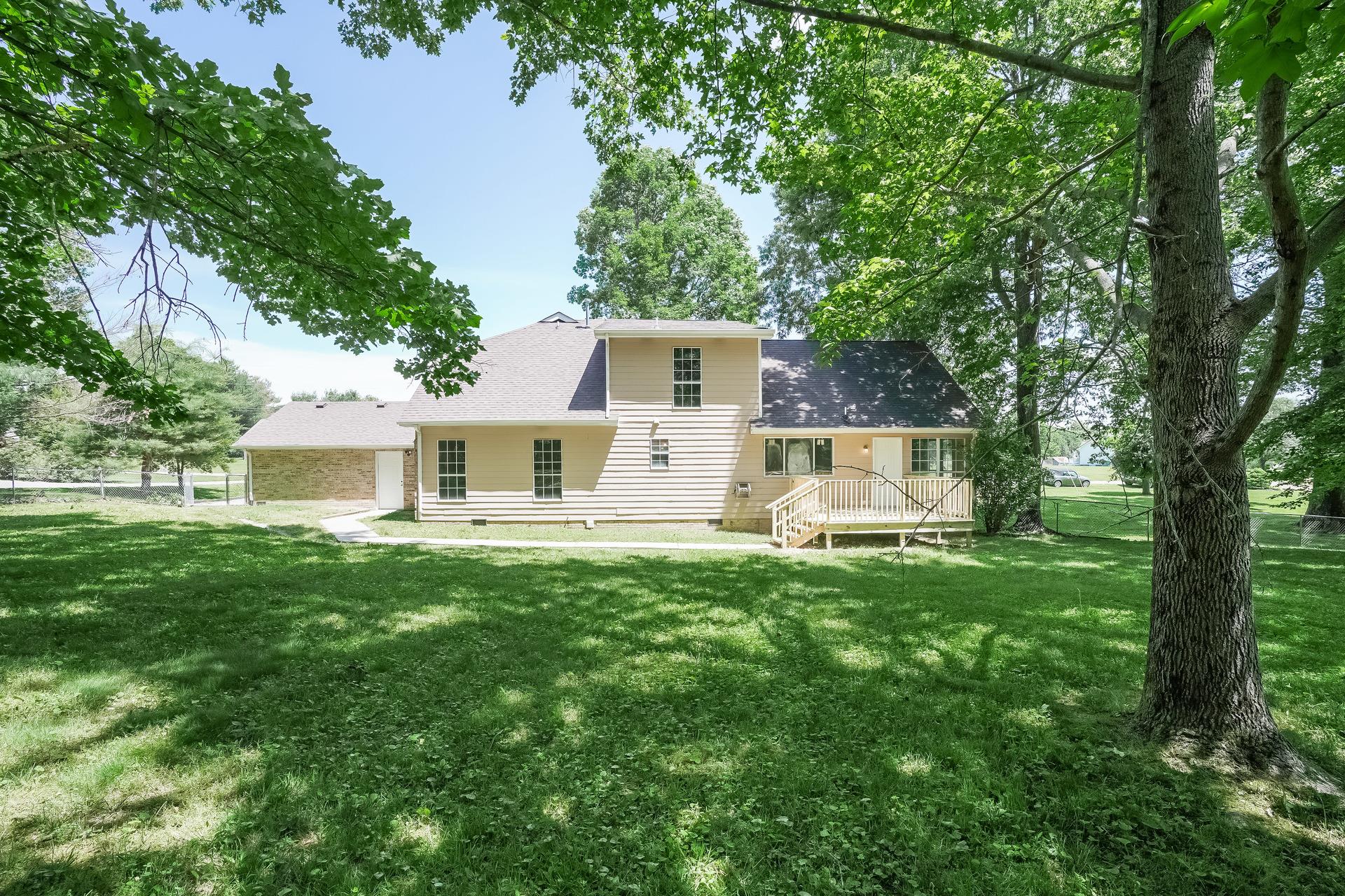 207 Independence Street Springfield, TN 37172 - Photo 5 of 25 a front view of a house with a garden