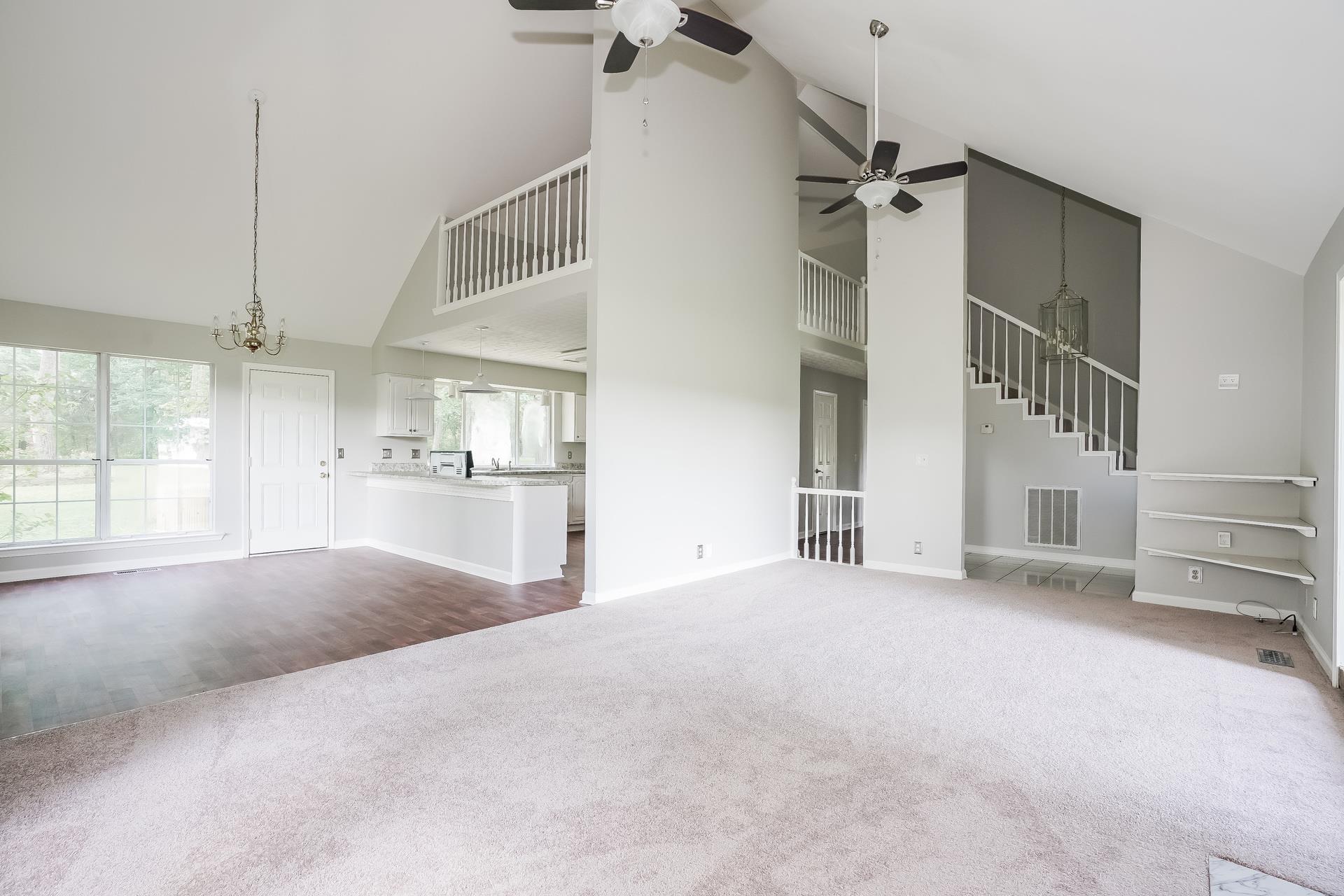 207 Independence Street Springfield, TN 37172 - Photo 9 of 25 a view of empty room with cabinet and windows