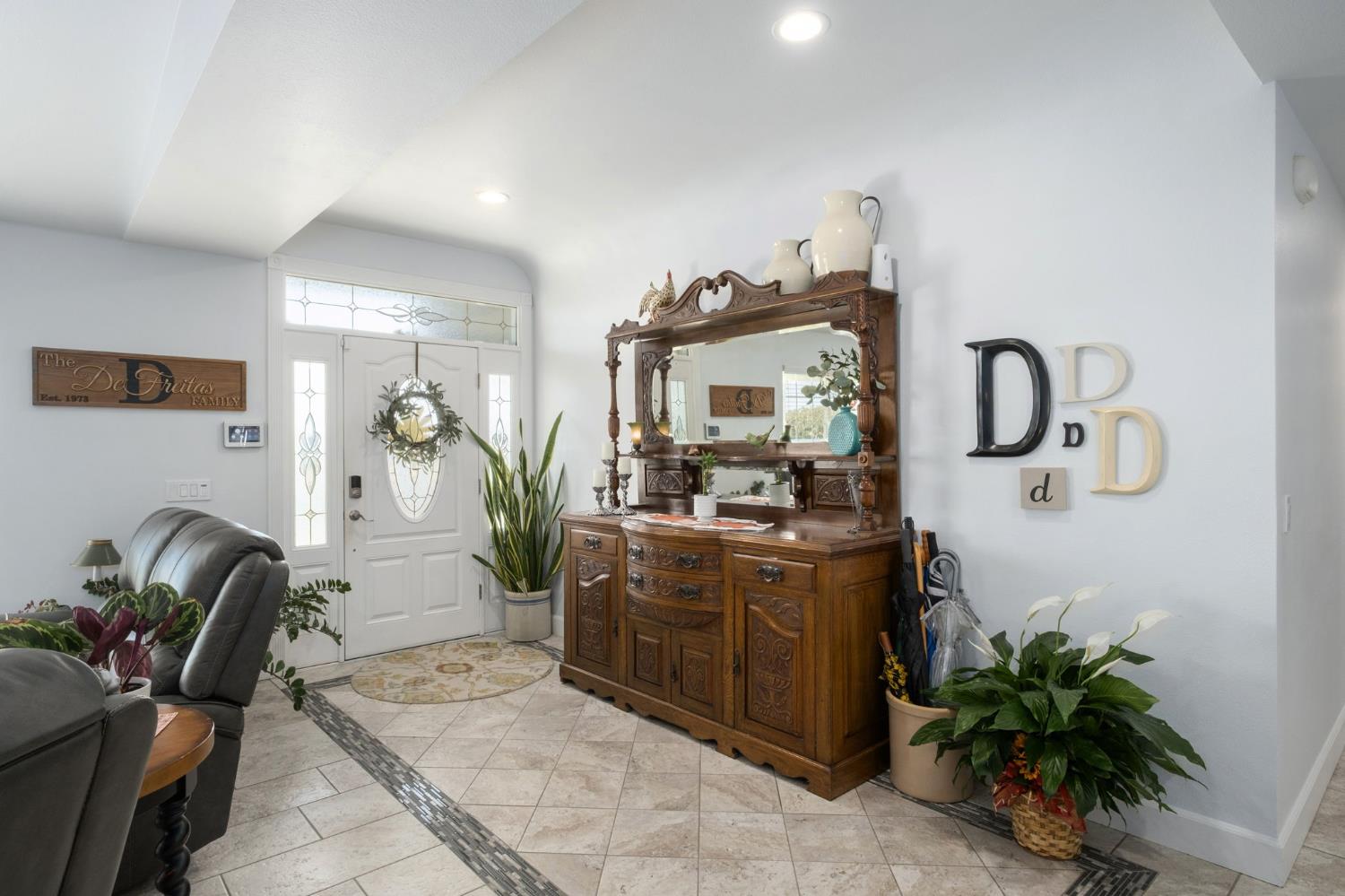 17534 West Lacey Boulevard Lemoore, CA 93245 - Photo 13 of 49 a living room with furniture flowerpot and a potted plant