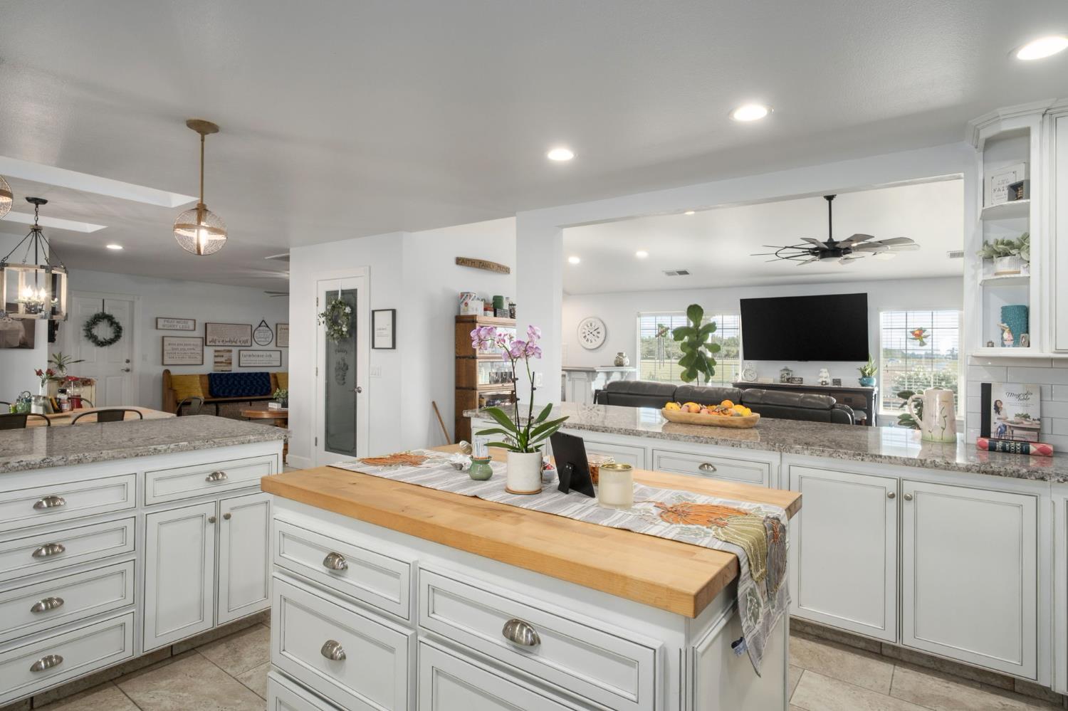 17534 West Lacey Boulevard Lemoore, CA 93245 - Photo 21 of 49 a kitchen with counter space cabinets and appliances