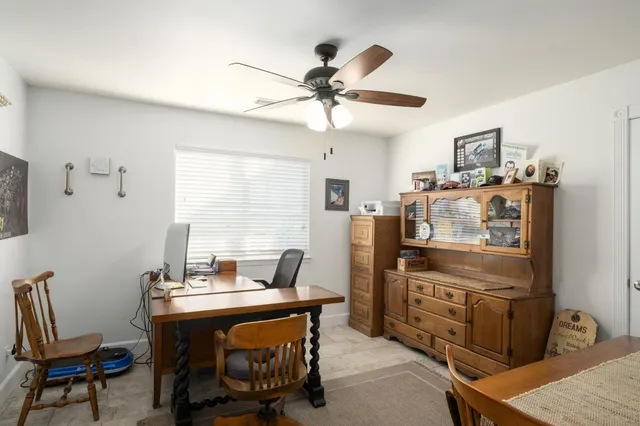a room with furniture and window