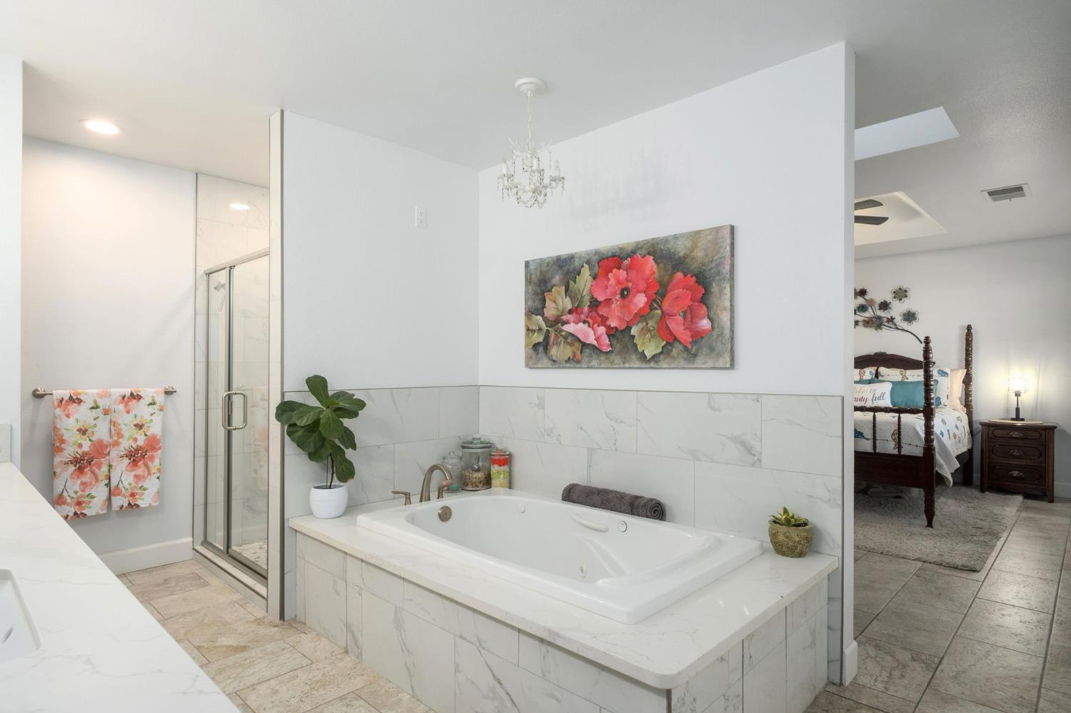 17534 West Lacey Boulevard Lemoore, CA 93245 - Photo 32 of 49 a bathroom with a sink and a bath tub