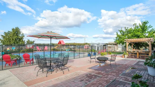 a view of a balcony with furniture