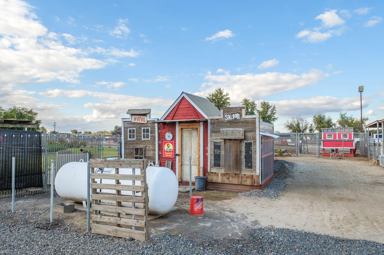 17534 West Lacey Boulevard Lemoore, CA 93245 - Photo 44 of 49 a view of roof deck with chair and tables