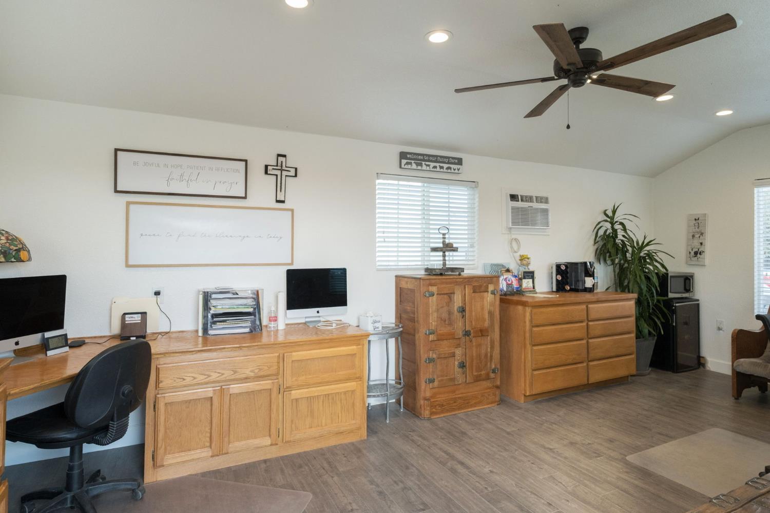 17534 West Lacey Boulevard Lemoore, CA 93245 - Photo 46 of 49 a room with furniture and white cabinets