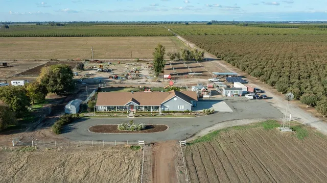 swimming pool view with a lake view