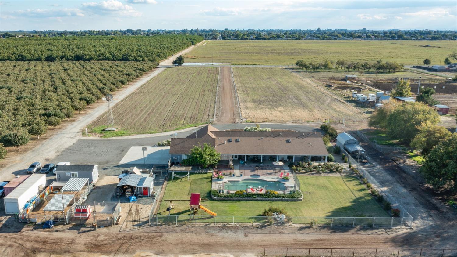 17534 West Lacey Boulevard Lemoore, CA 93245 - Photo 10 of 49 an aerial view of a house with outdoor space lake view and mountain view