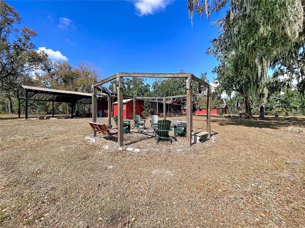 15210 Rough Diamond Ranch Road Lithia, FL 33547 - Photo 14 of 76 a view of outdoor space with seating area