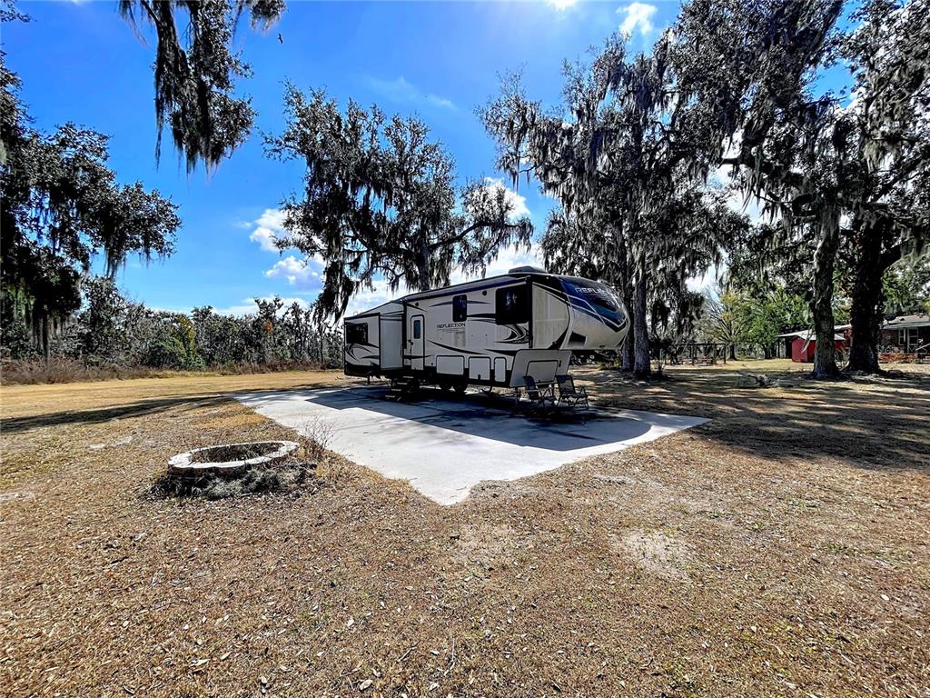 15210 Rough Diamond Ranch Road Lithia, FL 33547 - Photo 18 of 76 a car parked on the side of the road