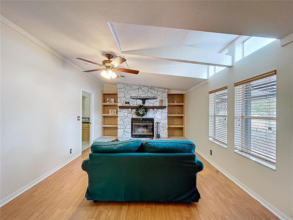 15210 Rough Diamond Ranch Road Lithia, FL 33547 - Photo 47 of 76 a living room with furniture and a window