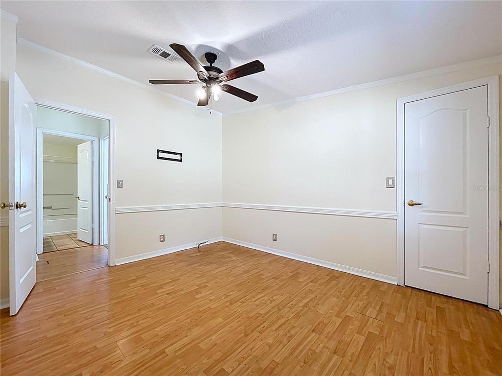 15210 Rough Diamond Ranch Road Lithia, FL 33547 - Photo 52 of 76 a view of a room with wooden floor