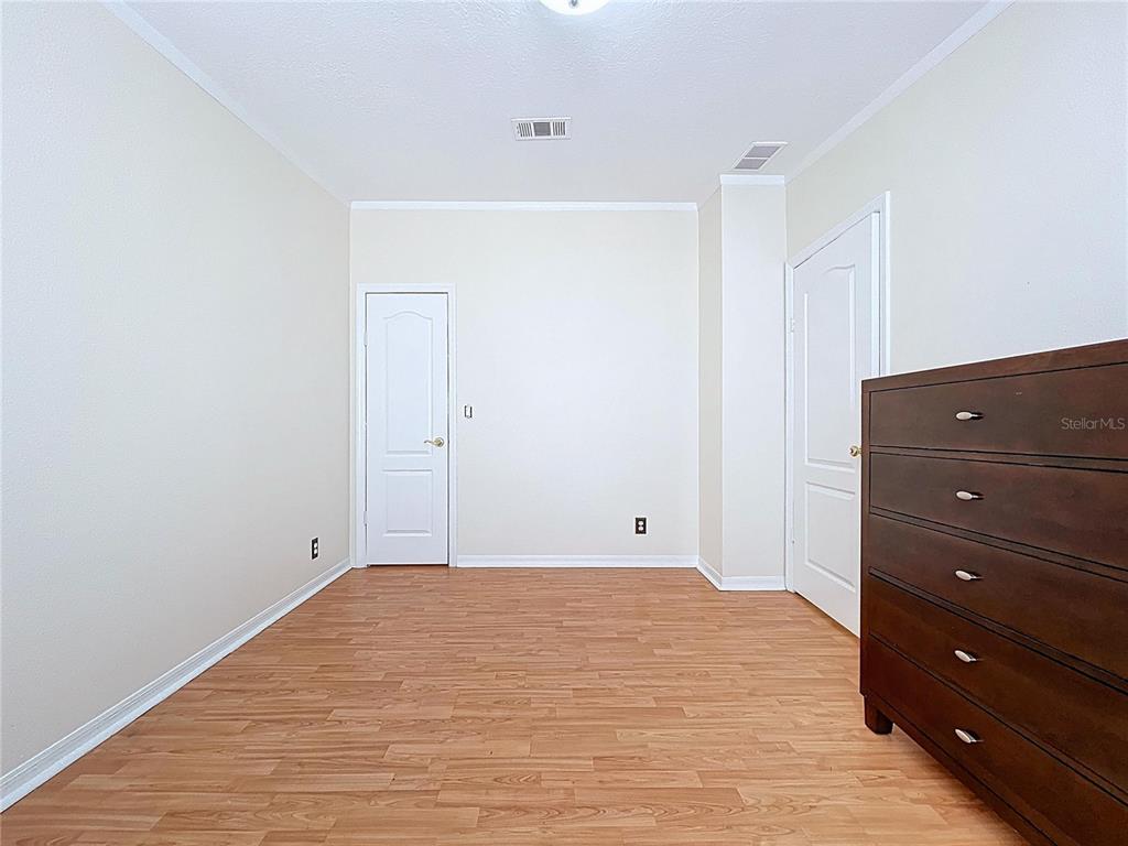 15210 Rough Diamond Ranch Road Lithia, FL 33547 - Photo 59 of 76 a room with a dresser in it