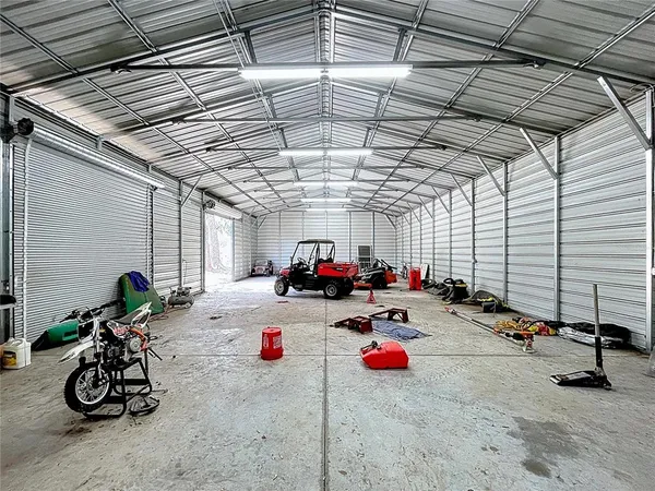 a view of a yard with trees