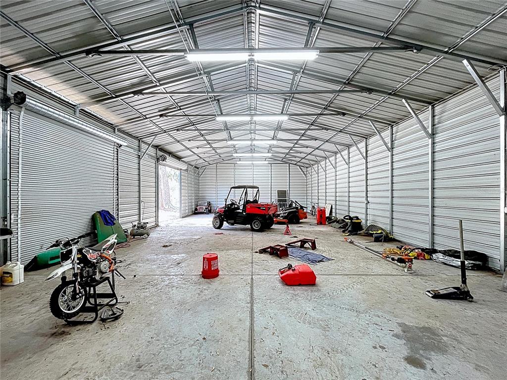 15210 Rough Diamond Ranch Road Lithia, FL 33547 - Photo 8 of 76 a view of a room with gym equipment