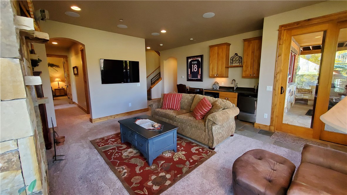 135 Game Trail Road Silverthorne, CO 80498 - Photo 23 of 34 Walk out to access hot tub and patio area.