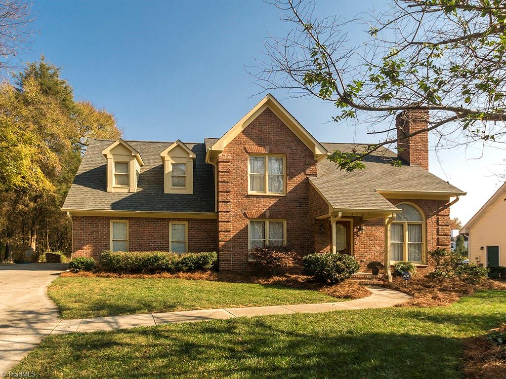 3101 Spring Mill Road Greensboro, NC 27406 - Photo 1 of 30 All brick home with side facing 2 car attached garage, cathedral ceilings in living room. Rear of home has serene pond view.