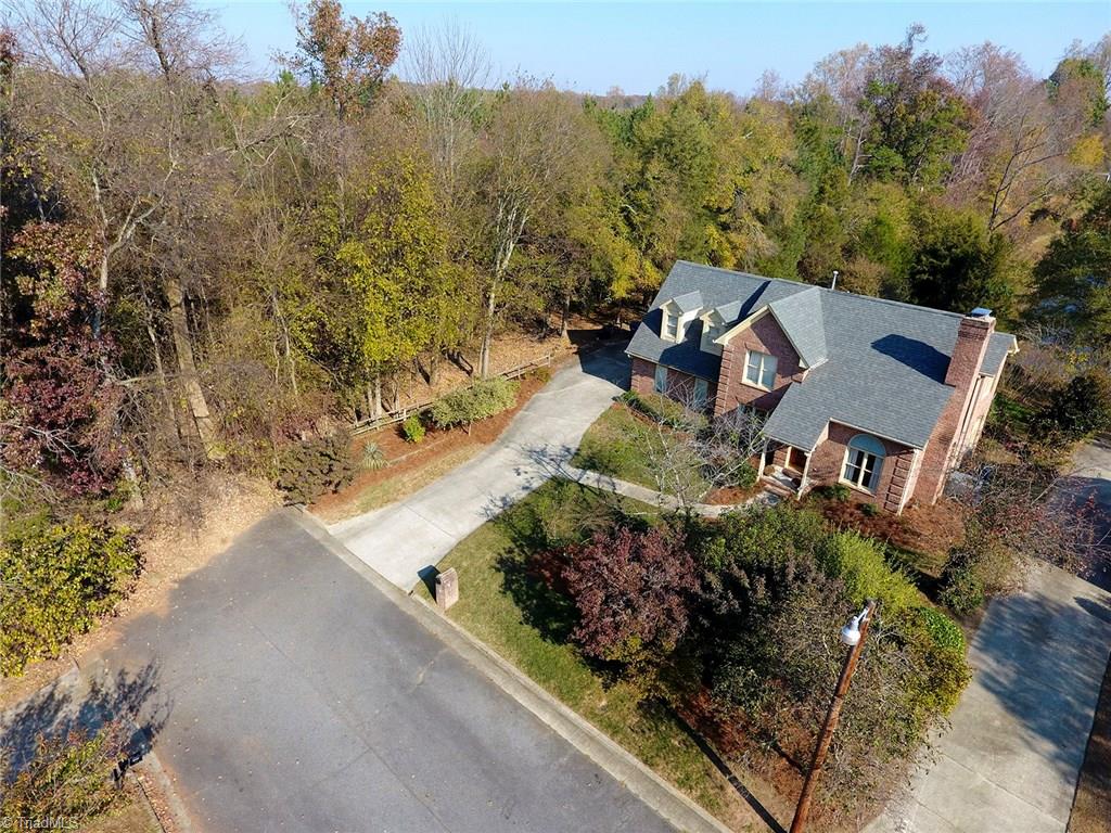 3101 Spring Mill Road Greensboro, NC 27406 - Photo 2 of 30 Low traffice area, as home is situated at the end of the cul de sac. Smartly placed privacy fence allows for privacy from your only side neighbor!