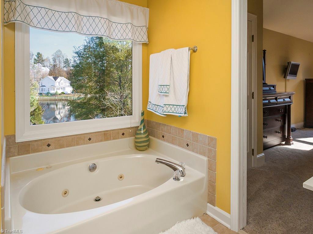 3101 Spring Mill Road Greensboro, NC 27406 - Photo 16 of 30 Separate tube with sneak peak of the gorgeous pond views!