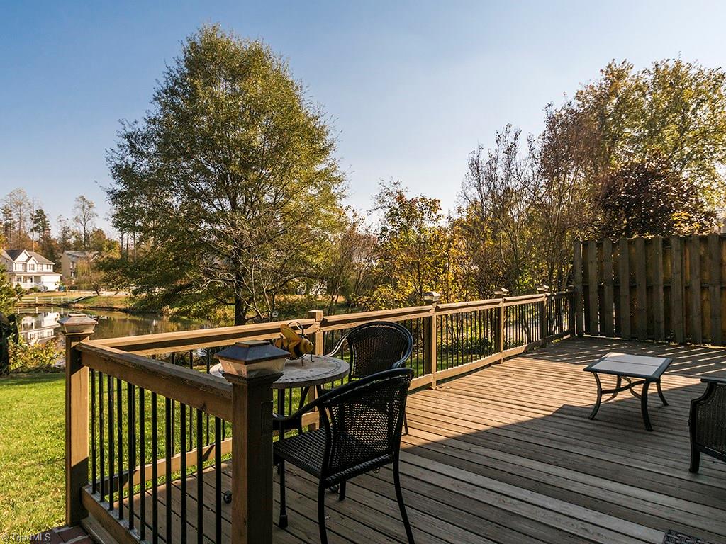3101 Spring Mill Road Greensboro, NC 27406 - Photo 21 of 30 View from deck!! Notice the classy balusters! To the right note the privacy fence strategically place to give just enough privacy but still leave the backyard feeling open and serene.