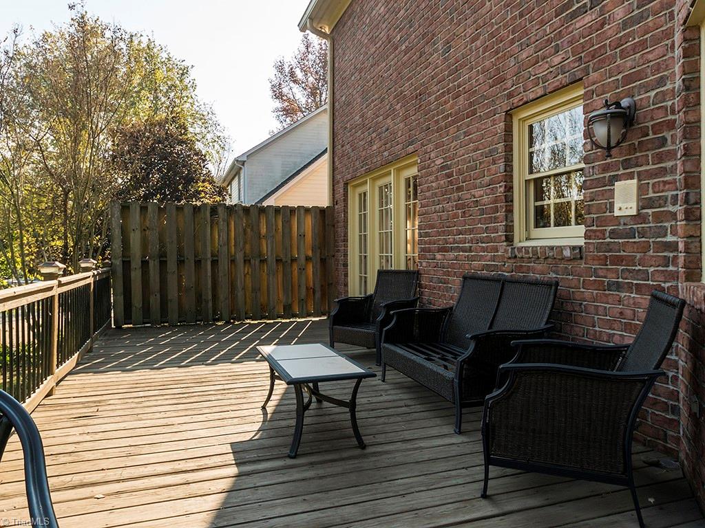 3101 Spring Mill Road Greensboro, NC 27406 - Photo 22 of 30 Another shot to show off the good use of privacy fencing and the length of the deck!
