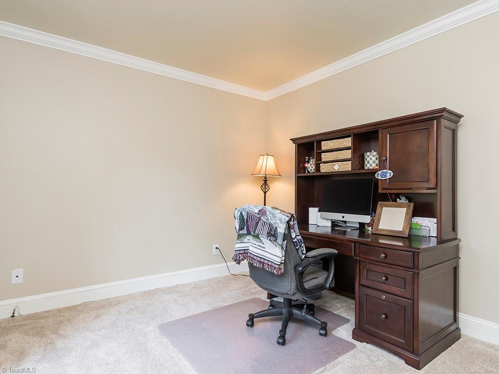 3101 Spring Mill Road Greensboro, NC 27406 - Photo 29 of 30 4th Bedroom currently being used as Home Office. Great separate location (it is to the left when you come in the house) for home office or guest bedroom.