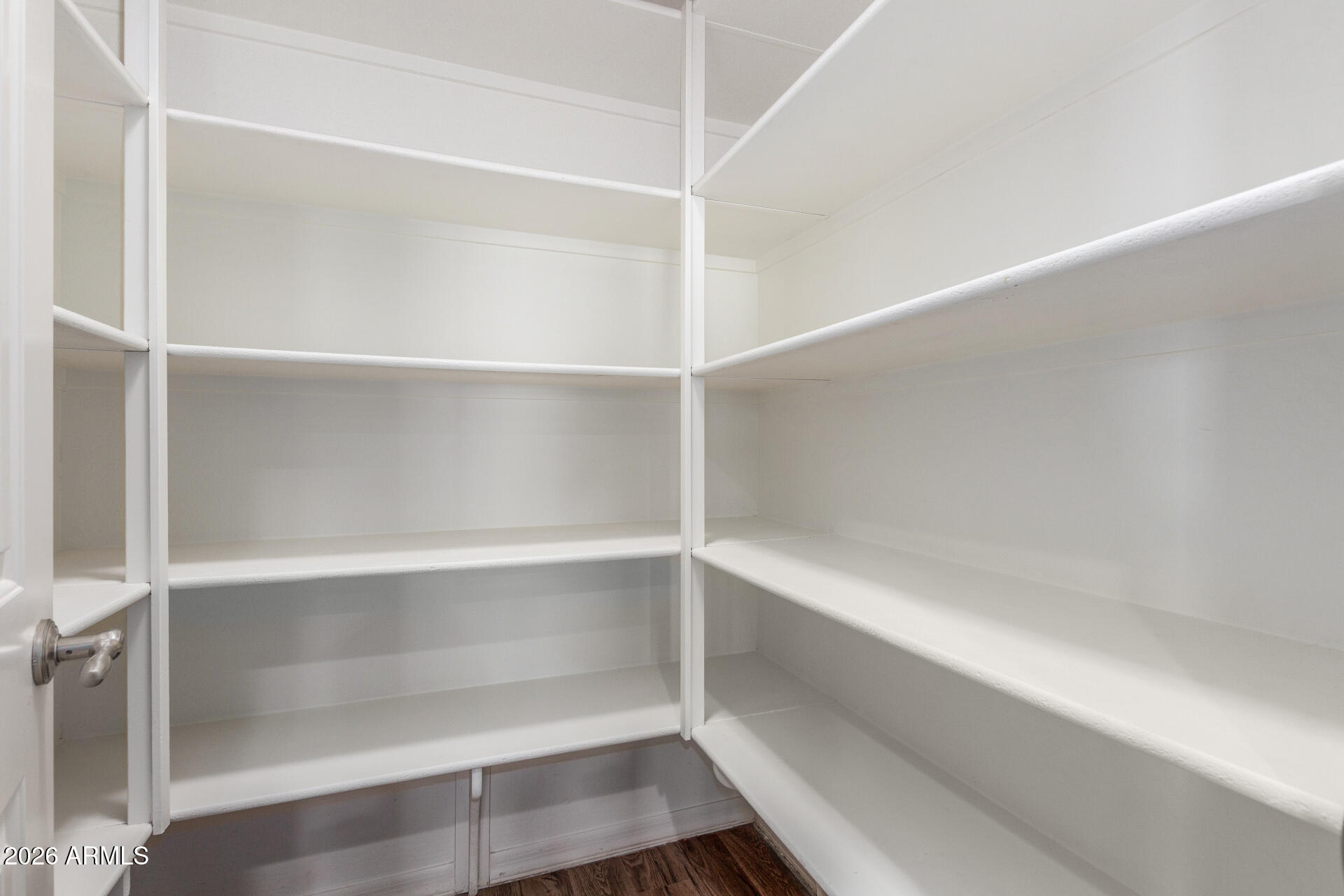 21294 West Berkeley Road Buckeye, AZ 85396 - Photo 12 of 34 a empty closet with white paint