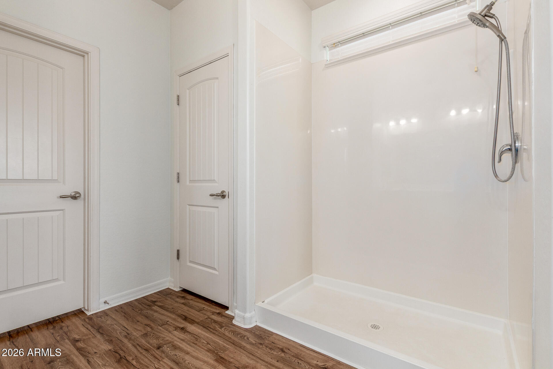 21294 West Berkeley Road Buckeye, AZ 85396 - Photo 17 of 34 a bathroom with a bathtub