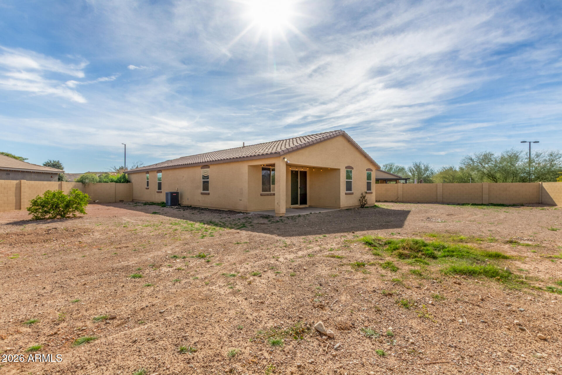 21294 West Berkeley Road Buckeye, AZ 85396 - Photo 32 of 34 a backyard of a house