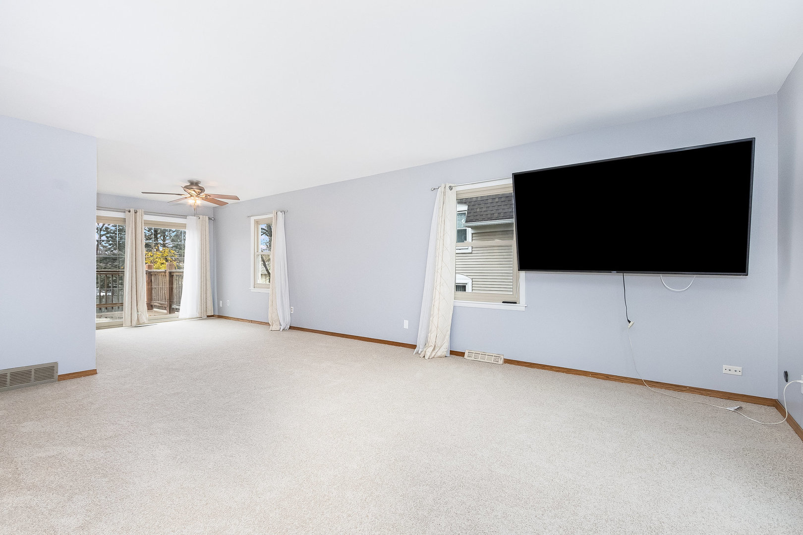 36 Field Point Road Montgomery, IL 60538 - Photo 12 of 28 a view of an empty room with a flat screen tv