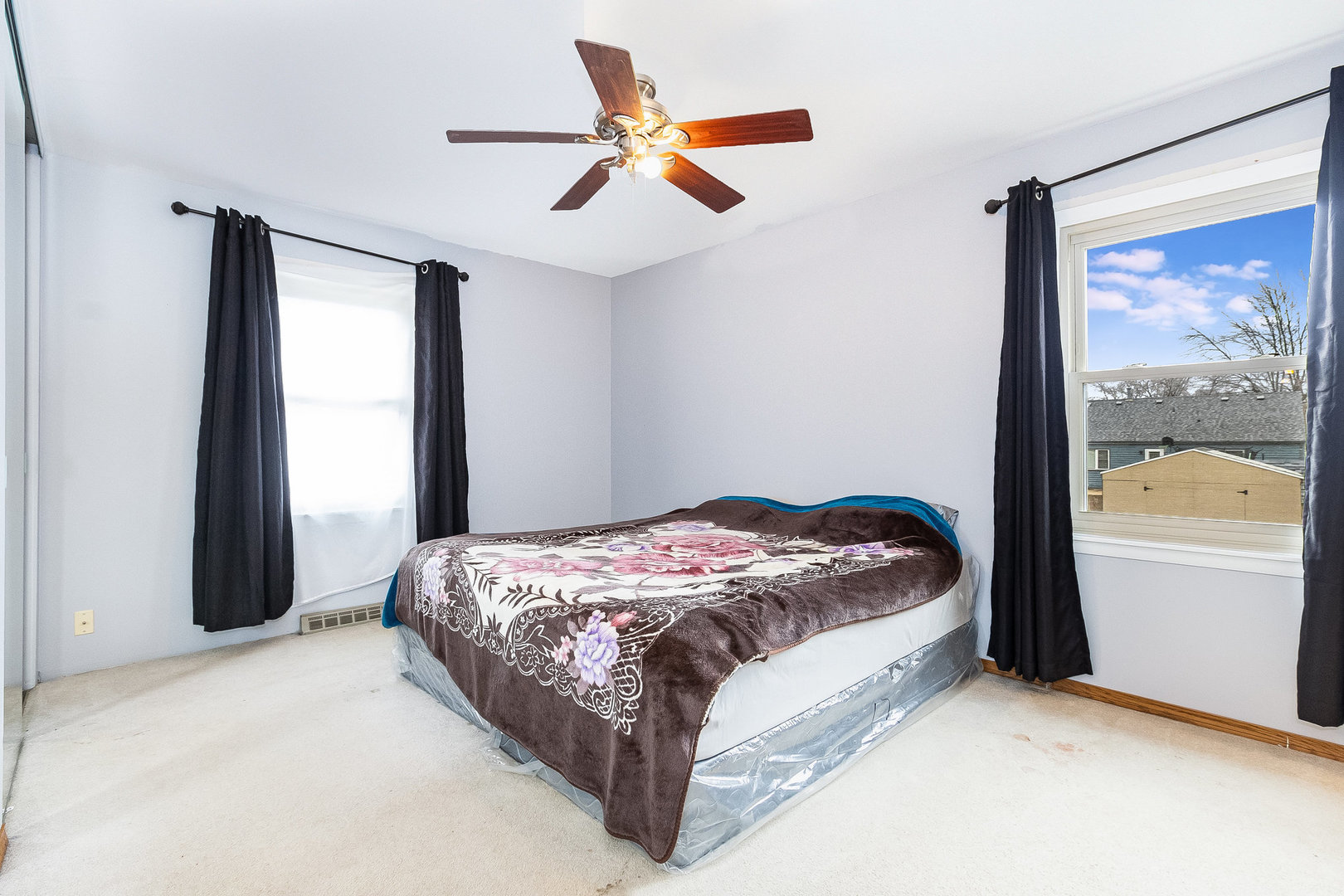 36 Field Point Road Montgomery, IL 60538 - Photo 15 of 28 a bed sitting in a bedroom next to a window