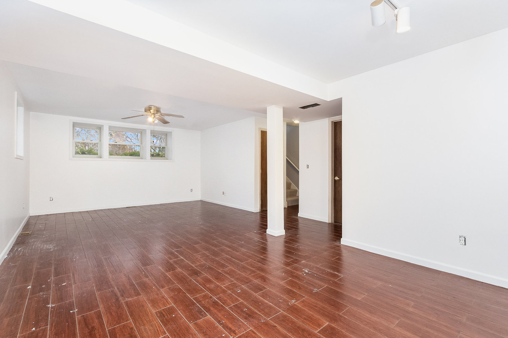 36 Field Point Road Montgomery, IL 60538 - Photo 23 of 28 a view of an empty room with wooden floor