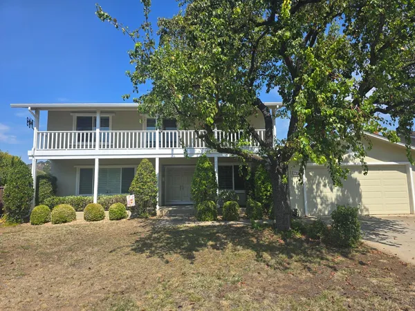 a front view of a house with a porch