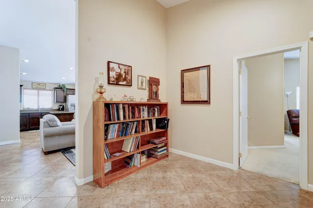 a room with furniture and a book shelf