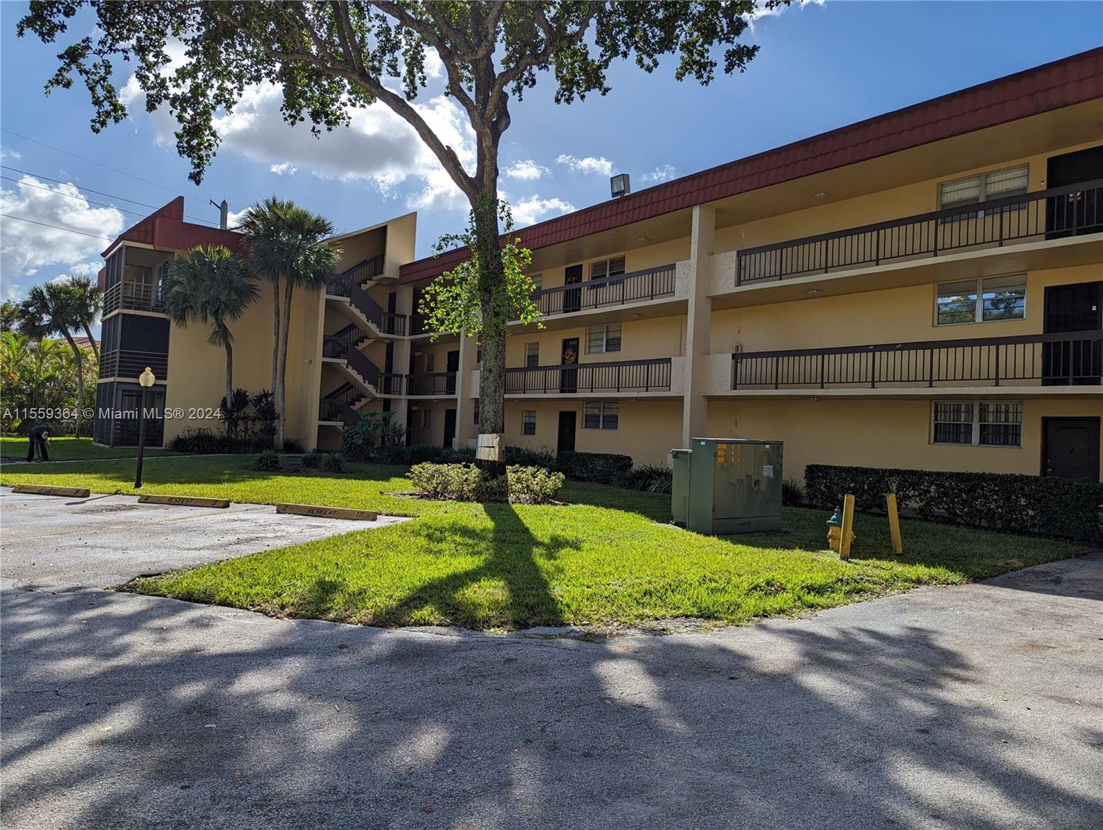 3490 Foxcroft Road, Unit B310 Miramar, FL 33025 - Photo 1 of 34 a view of a backyard with a small cabin