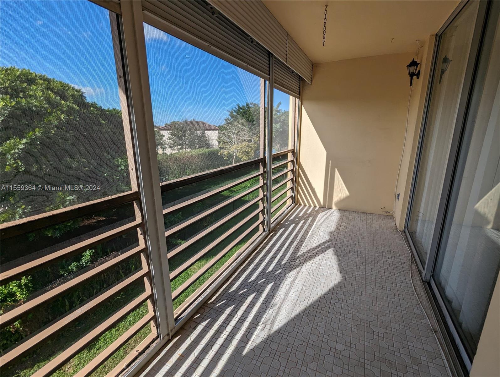 3490 Foxcroft Road, Unit B310 Miramar, FL 33025 - Photo 11 of 34 a view of a balcony
