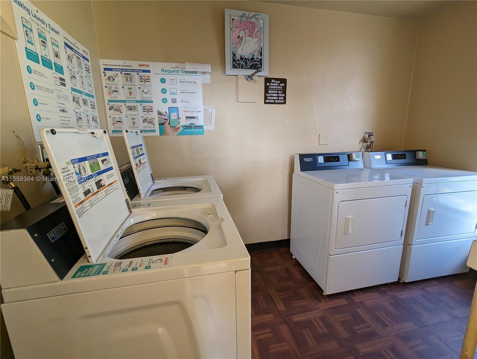 3490 Foxcroft Road, Unit B310 Miramar, FL 33025 - Photo 33 of 34 a utility room with dryer and washer