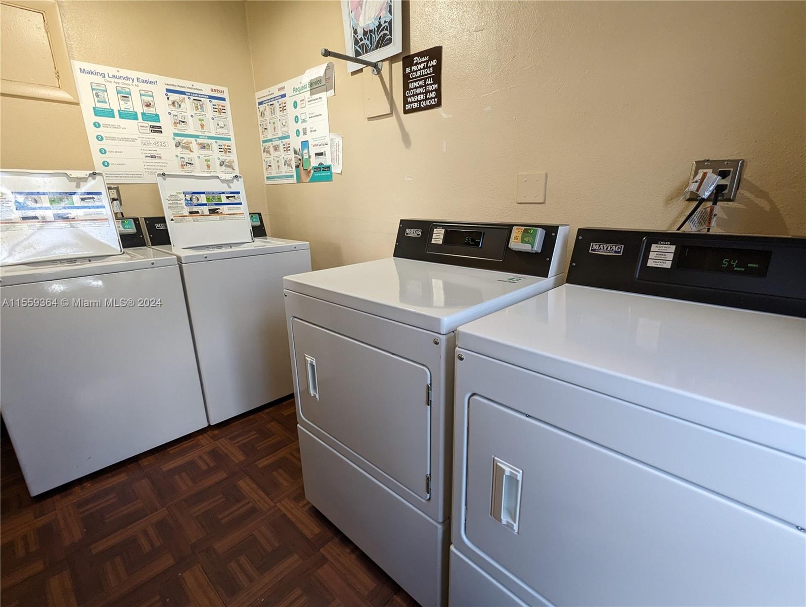 3490 Foxcroft Road, Unit B310 Miramar, FL 33025 - Photo 34 of 34 a utility room with dryer and washer