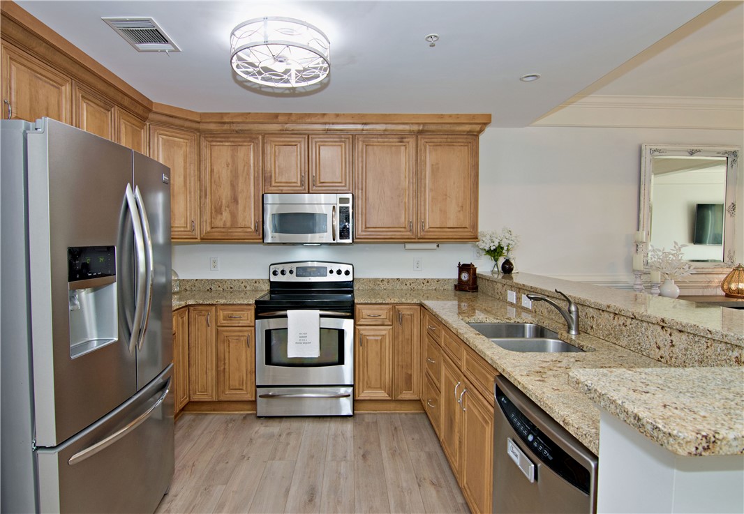 601 Watermarke Lane Anderson, SC 29625 - Photo 4 of 25 This bright kitchen features ample counter space and storage for culinary enthusiasts.